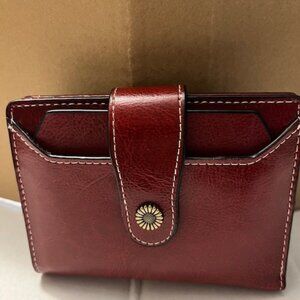 Compact wallet in trendy oxblood red.